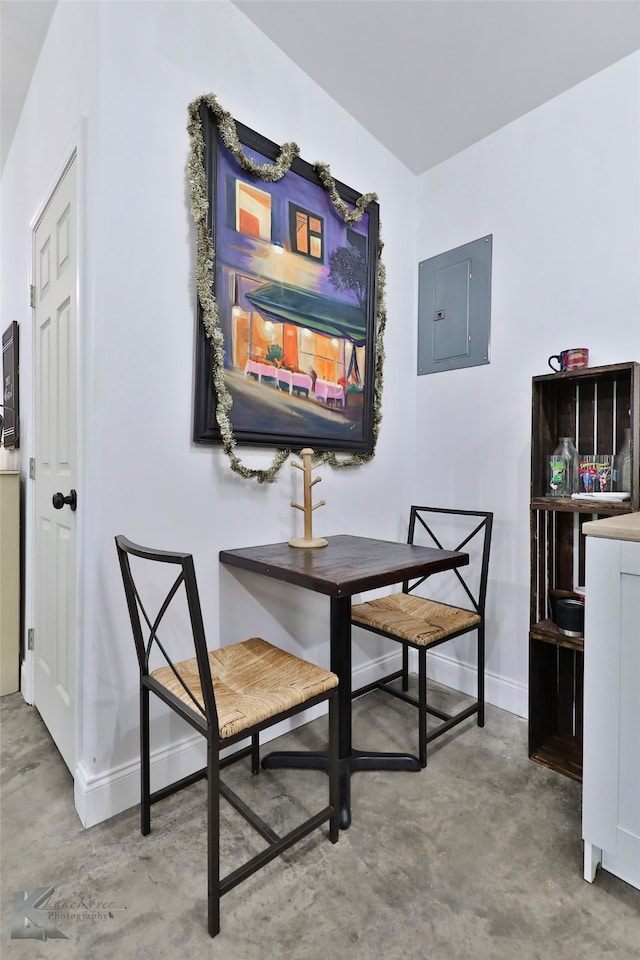 dining area featuring concrete floors