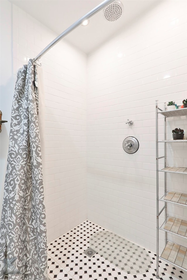 bathroom with a shower with shower curtain