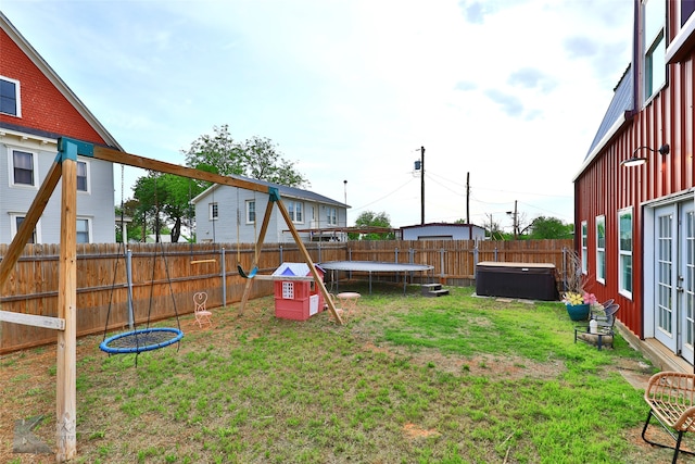 view of yard featuring a trampoline