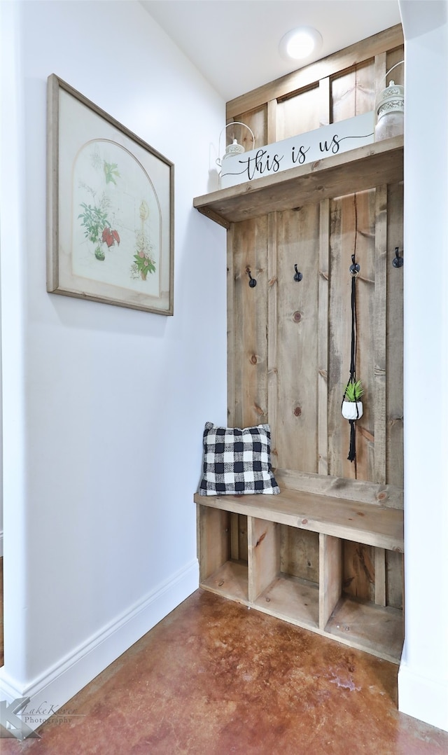 mudroom featuring concrete flooring