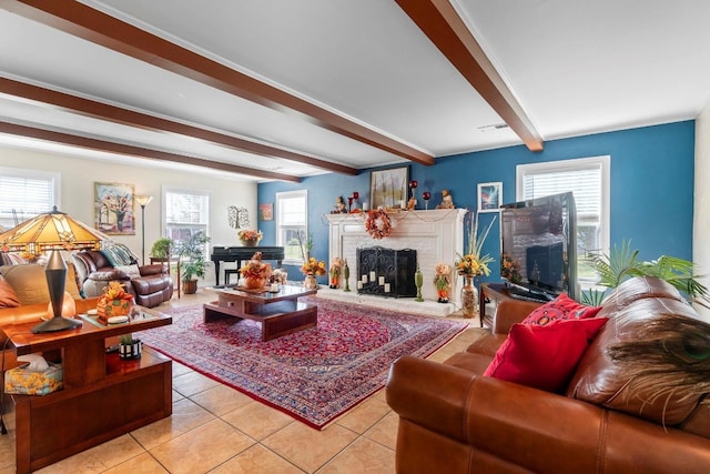 tiled living room featuring a brick fireplace and beam ceiling