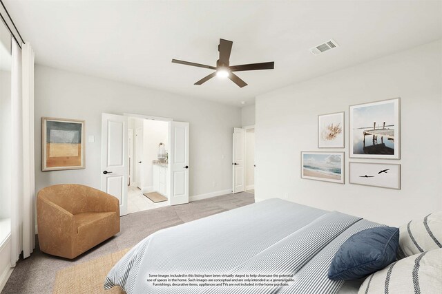 bedroom with light colored carpet, visible vents, connected bathroom, and baseboards