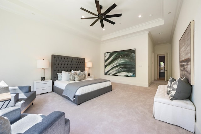 bedroom featuring light carpet, ceiling fan, a raised ceiling, and ornamental molding