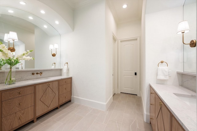 bathroom with vanity and crown molding