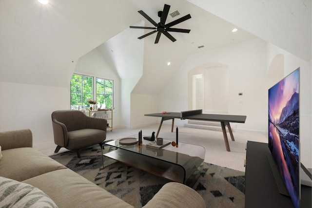 living room with carpet, lofted ceiling, and ceiling fan