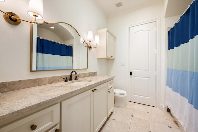 bathroom featuring ornamental molding, tile patterned flooring, vanity, and toilet