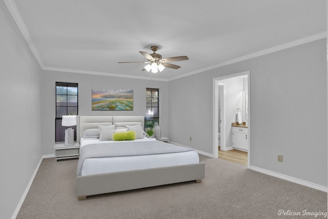 bedroom featuring ceiling fan, ornamental molding, carpet flooring, and ensuite bathroom