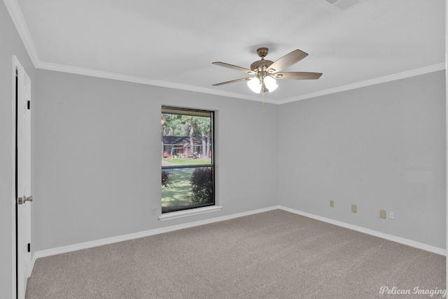 carpeted empty room with ornamental molding and ceiling fan