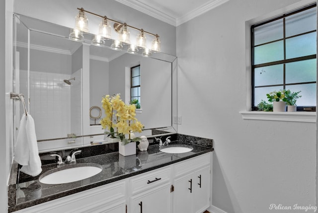 bathroom featuring vanity and ornamental molding