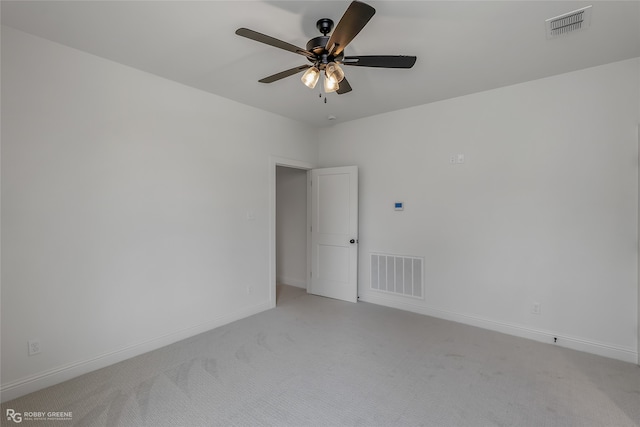 unfurnished room featuring carpet floors and ceiling fan