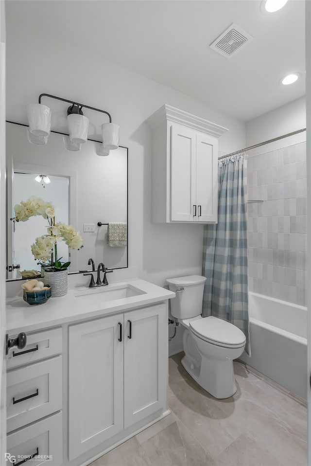 full bathroom with vanity, tile patterned floors, shower / bath combo, and toilet