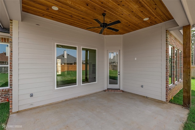 view of patio featuring ceiling fan