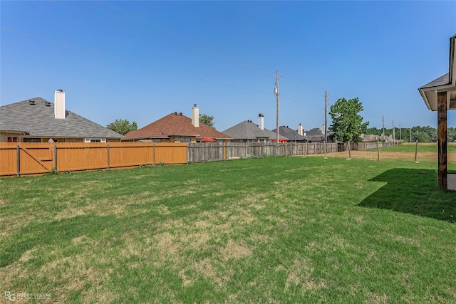 view of yard with fence