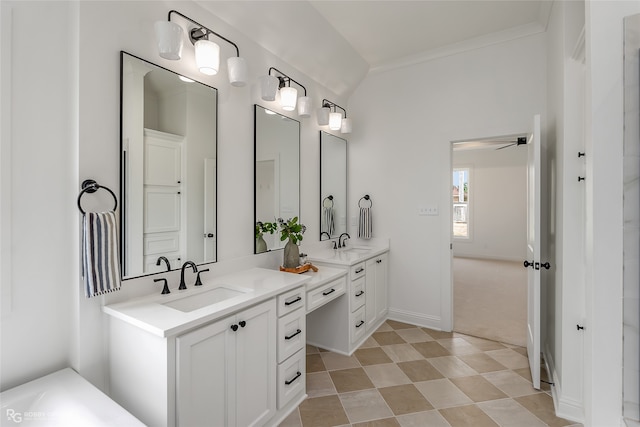 bathroom featuring tile patterned flooring, double vanity, and ceiling fan