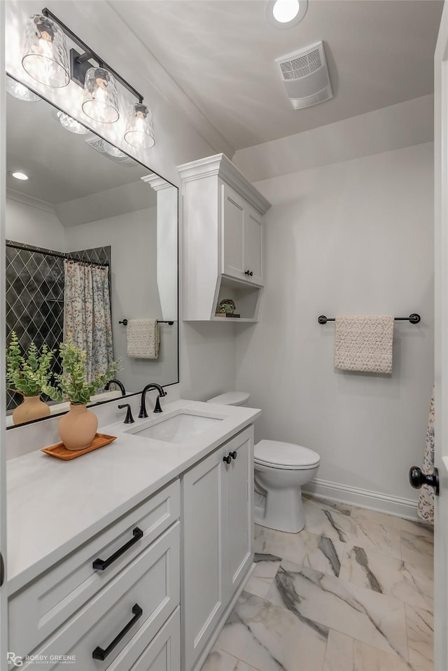 bathroom with toilet, vanity, visible vents, baseboards, and marble finish floor