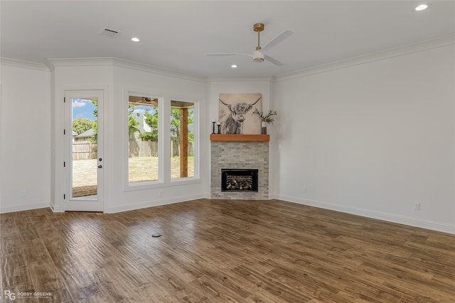 unfurnished living room featuring ornamental molding, ceiling fan, and hardwood / wood-style floors