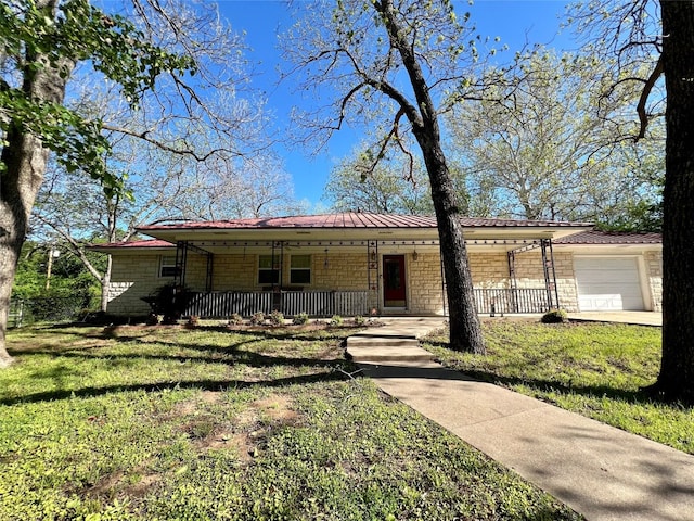 ranch-style home with a porch and a front lawn