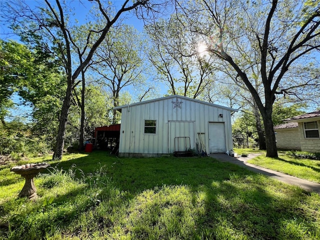 view of shed / structure with a lawn