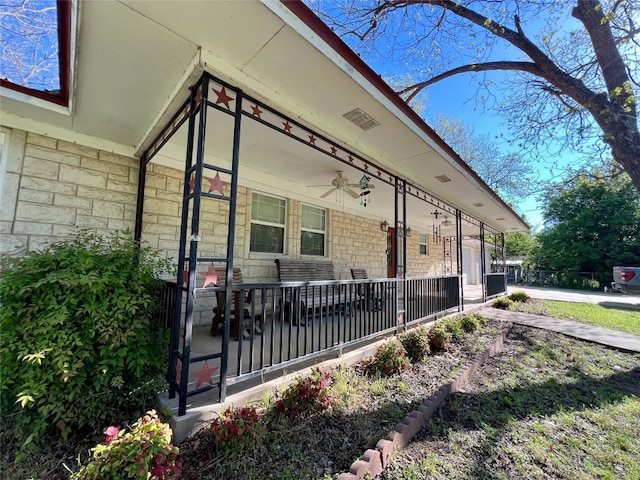 view of side of home featuring a porch