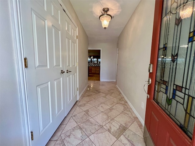 hall with light tile floors