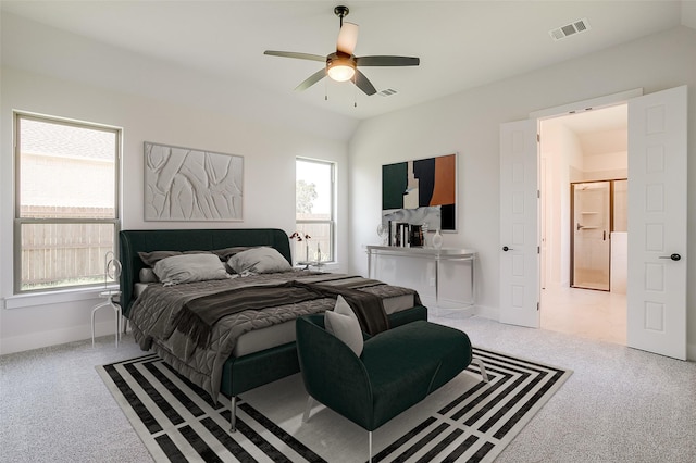 bedroom with ceiling fan, light carpet, and lofted ceiling