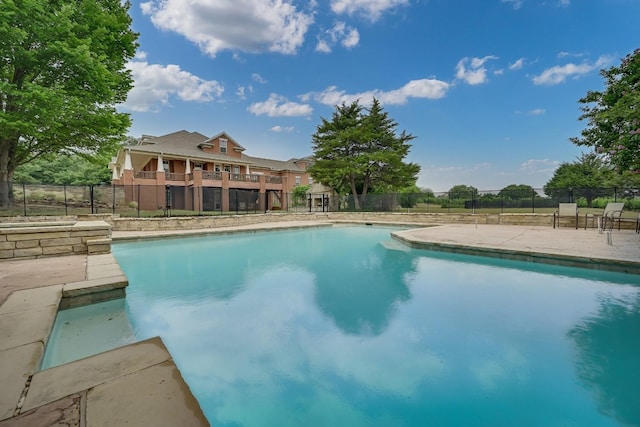 view of pool with a patio area