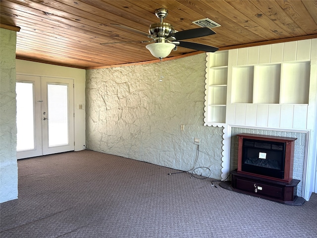 unfurnished living room featuring ceiling fan, carpet, french doors, and wooden ceiling