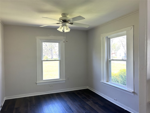 spare room featuring ceiling fan and a healthy amount of sunlight