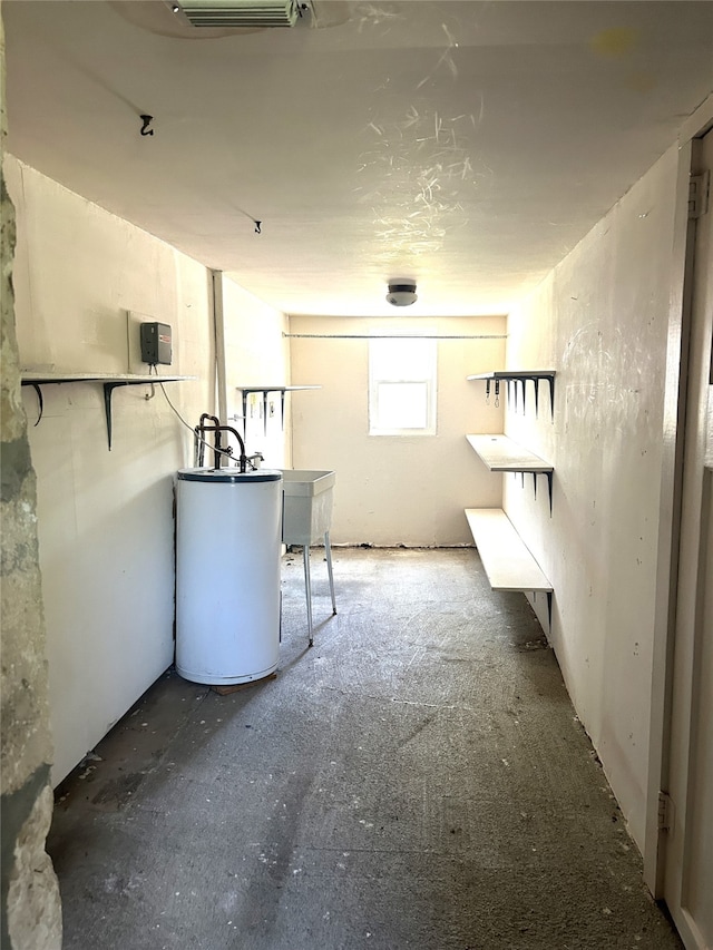 kitchen featuring a breakfast bar and water heater