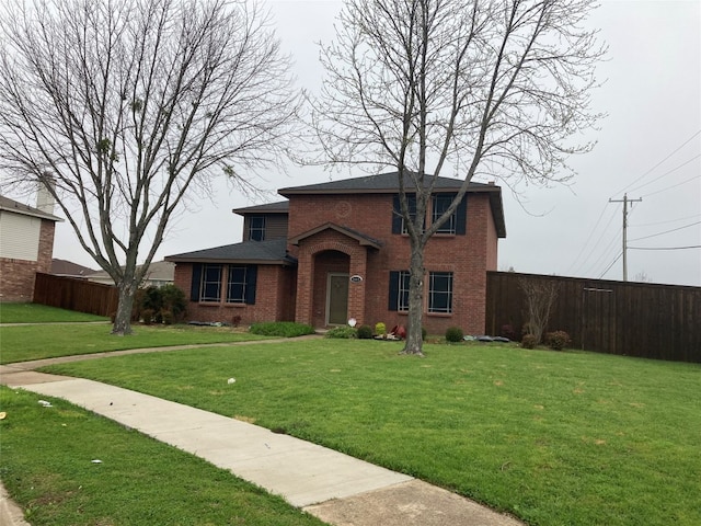 view of front facade with a front lawn