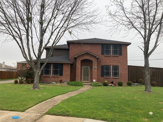 view of front of home featuring a front yard