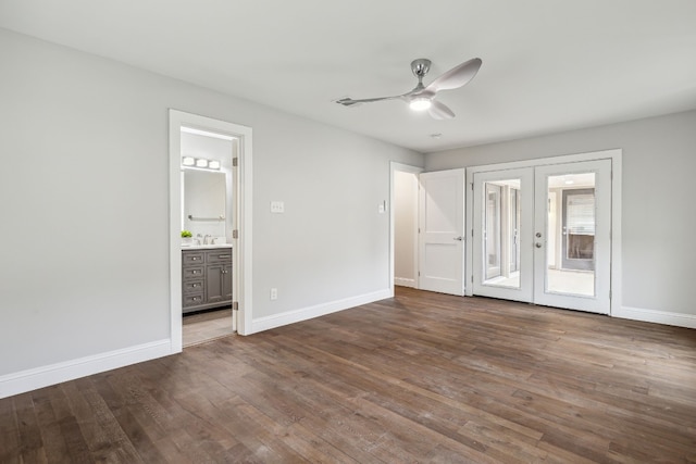 unfurnished bedroom featuring ensuite bath, french doors, ceiling fan, and wood-type flooring