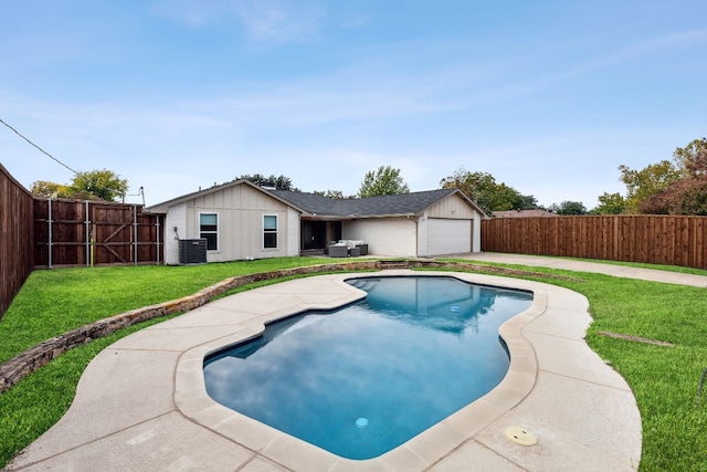 view of pool with a fenced backyard, a fenced in pool, central AC, and a lawn