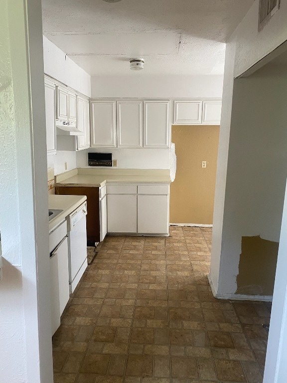 kitchen with white cabinets and dishwasher