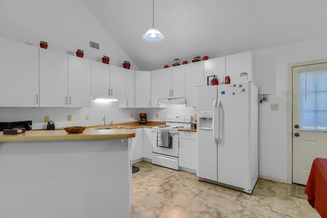 kitchen featuring light tile flooring, white appliances, and white cabinets