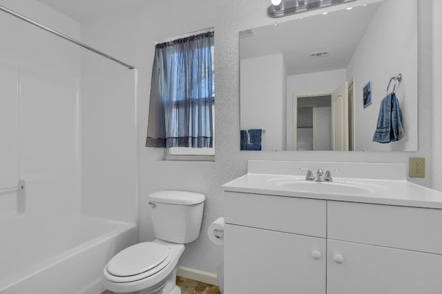 full bathroom with toilet, shower / washtub combination, and vanity with extensive cabinet space