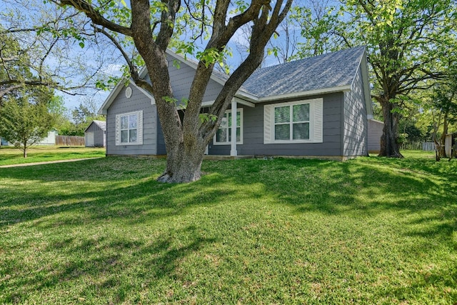 view of front of property with a front lawn