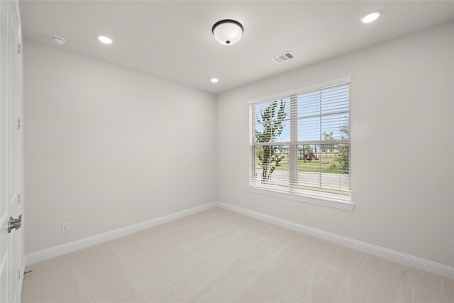 empty room with carpet flooring