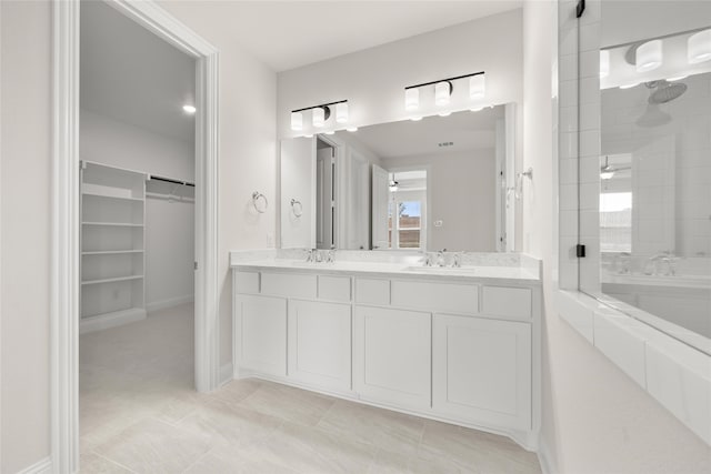 bathroom featuring tile floors, dual vanity, and independent shower and bath