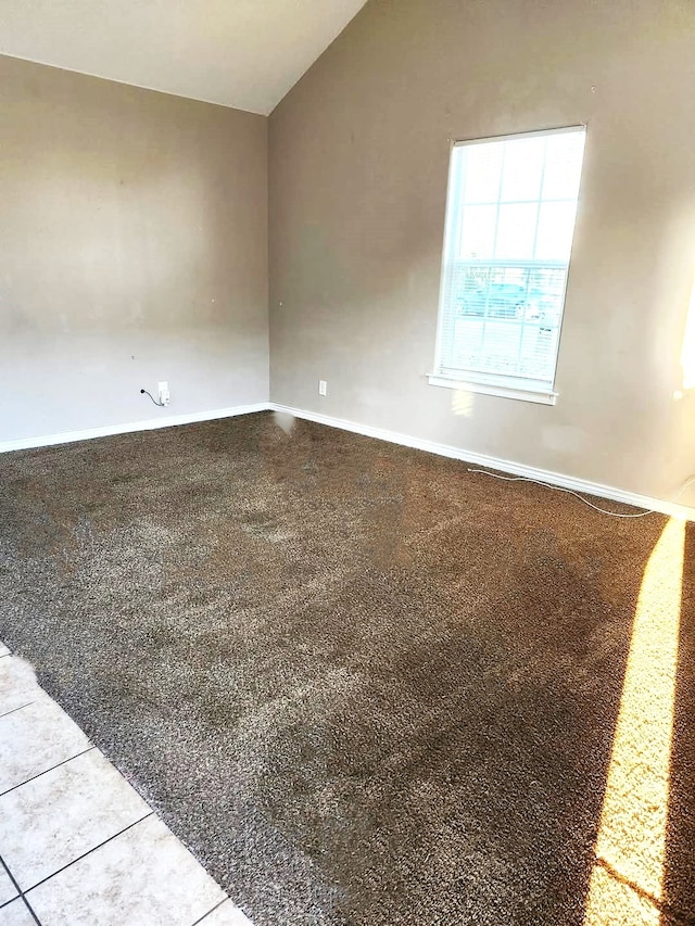 spare room with tile patterned floors