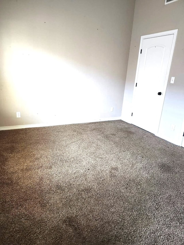 view of carpeted spare room