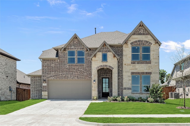 view of front facade featuring central AC unit, a garage, and a front lawn