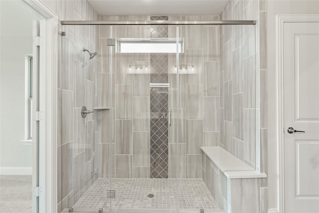 bathroom featuring an enclosed shower