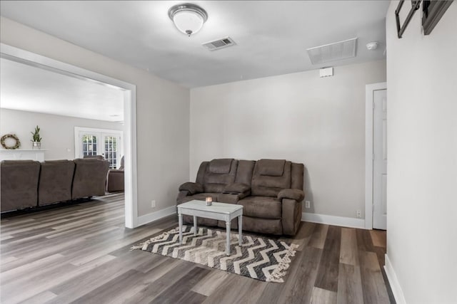 sitting room featuring hardwood / wood-style floors