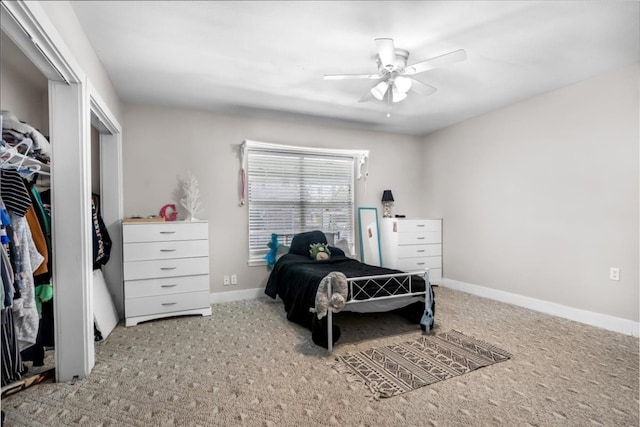 carpeted bedroom featuring ceiling fan