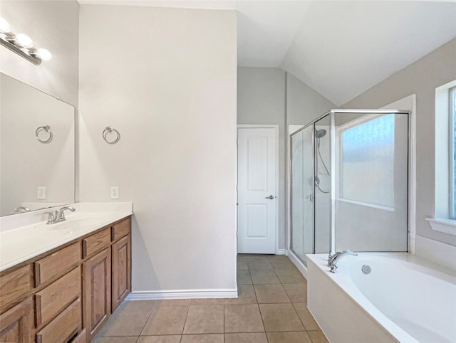 bathroom featuring lofted ceiling, tile flooring, vanity, and independent shower and bath