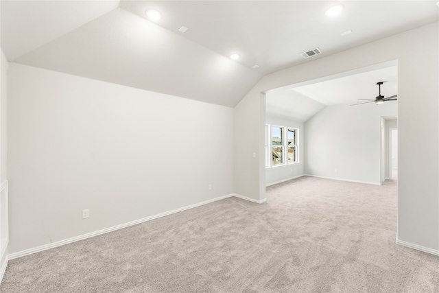 bonus room with light carpet, ceiling fan, and lofted ceiling