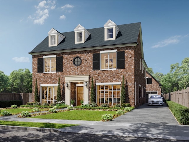 view of front facade with a front lawn