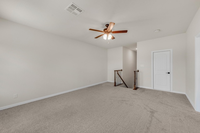 carpeted empty room with ceiling fan