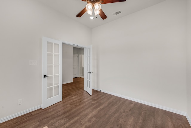 unfurnished bedroom featuring french doors, ceiling fan, and hardwood / wood-style floors